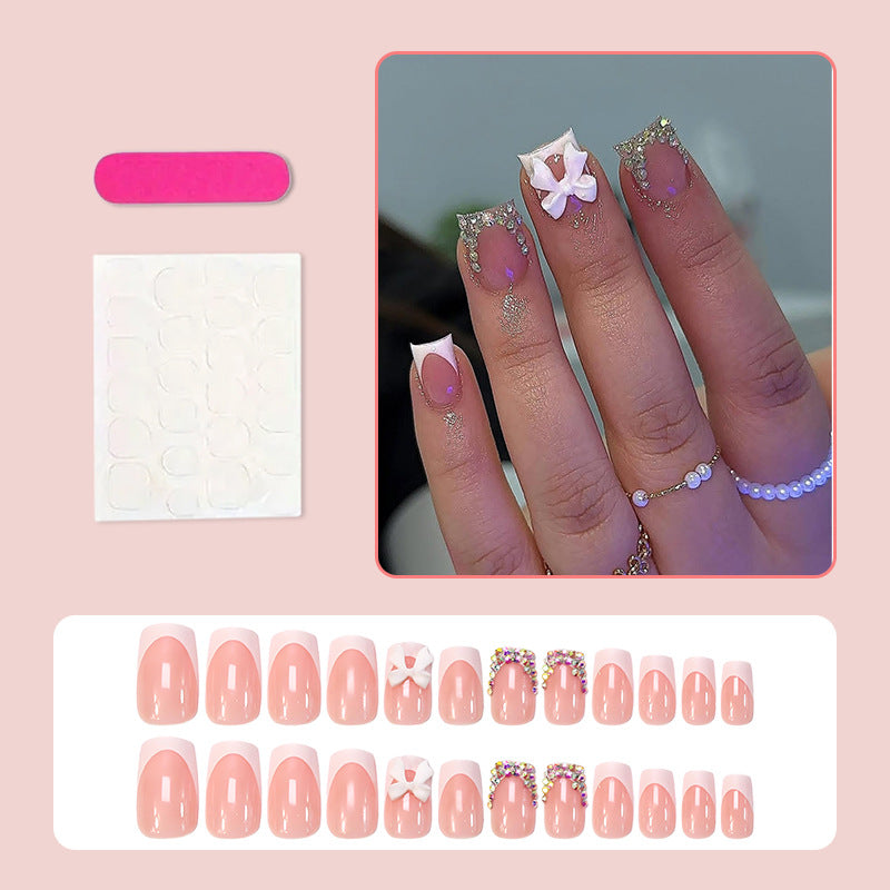Aufklebbare Nägel mit Schleife und Diamanten