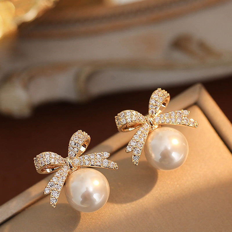 Bow glitter diamond earrings
