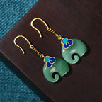Cold enamel plated Xiangyun elephant Hetian jade earrings