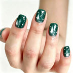 Dark green cat eye with white polka dots press on nails