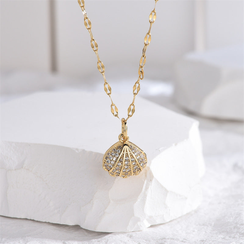 Micropaved zirconia pearl shell necklace