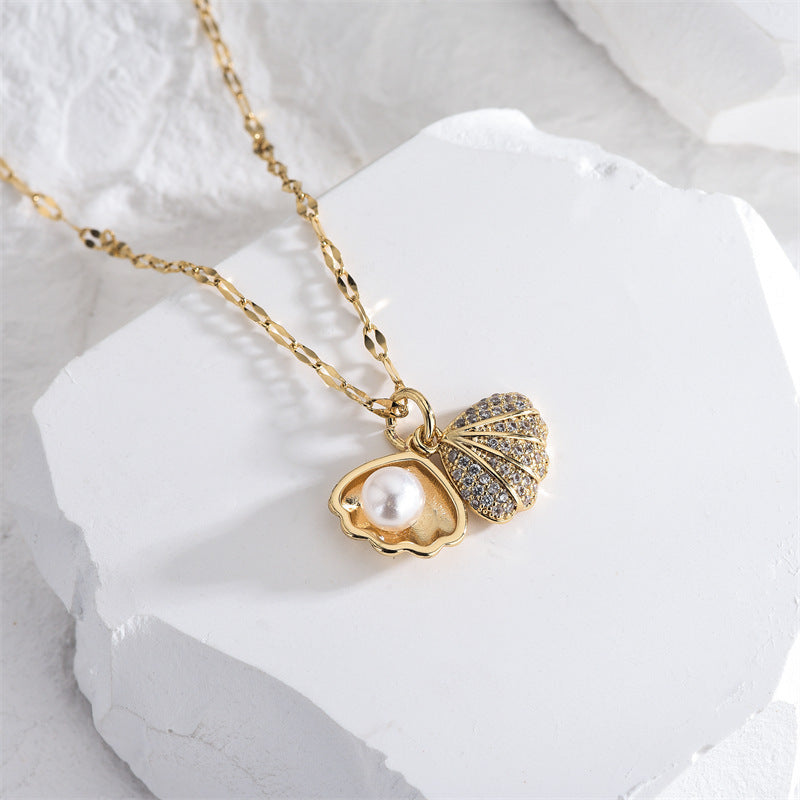 Micropaved zirconia pearl shell necklace