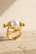 Cozy Floating Pearl in a Gold Orbit Ring