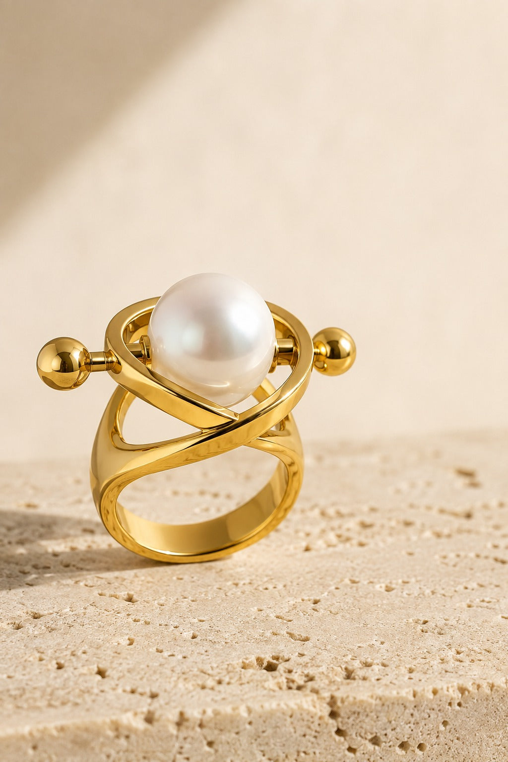 Cozy Floating Pearl in a Gold Orbit Ring