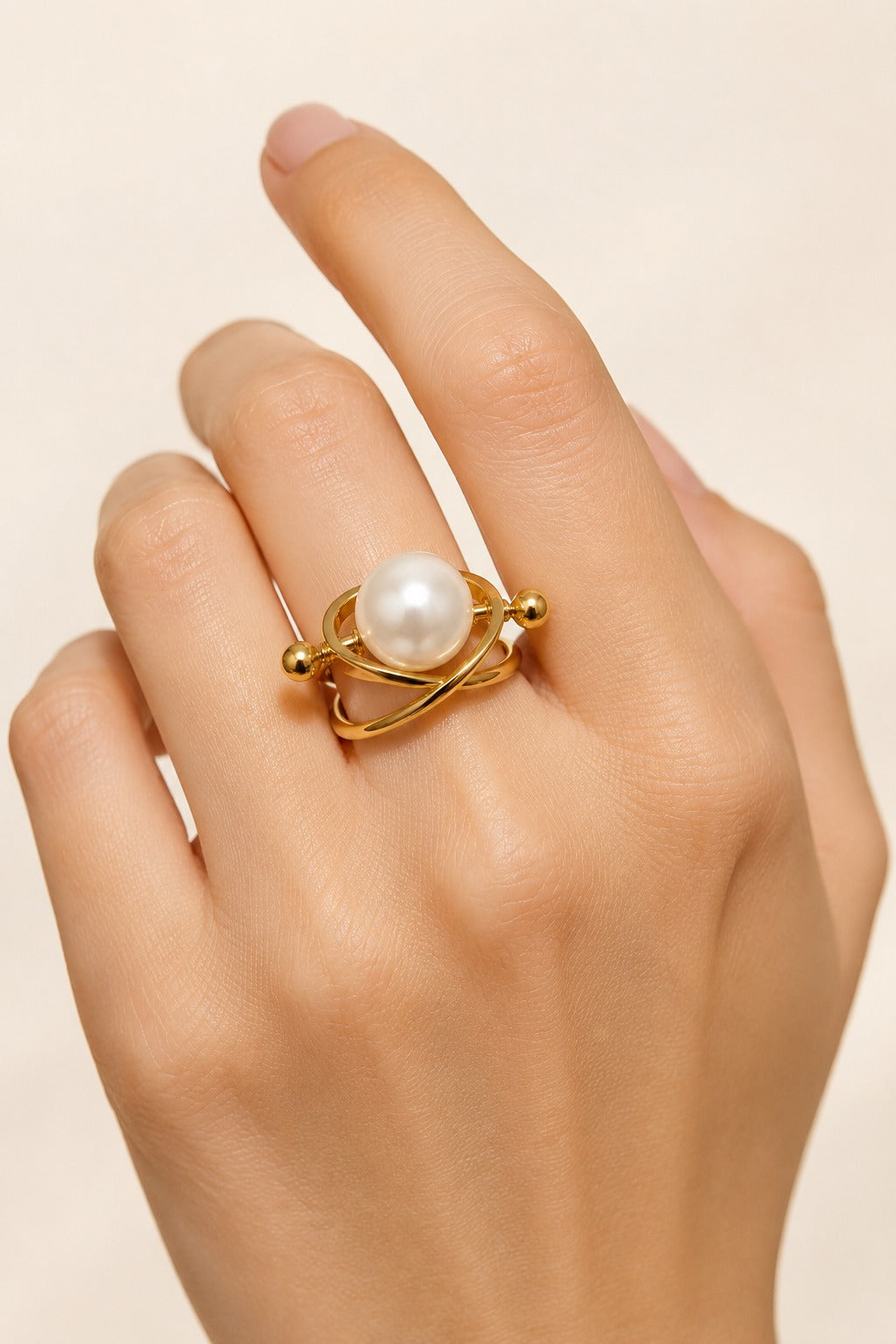 Cozy Floating Pearl in a Gold Orbit Ring