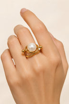 Cozy Floating Pearl in a Gold Orbit Ring